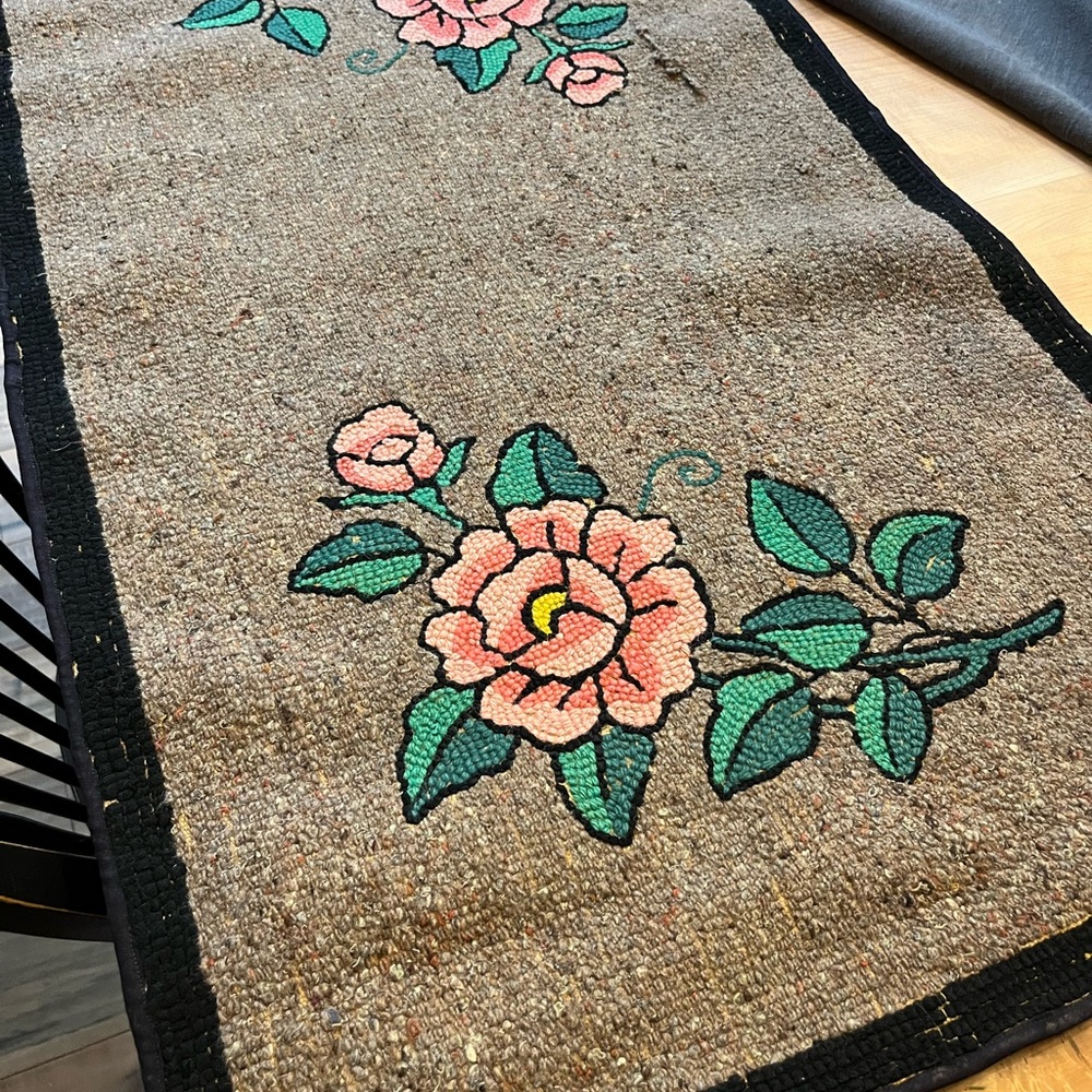 Vintage rose hooked rug
